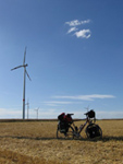 Mihai's bike in front of a wind turbine